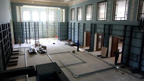Timelapse of drywall and floor installation in coworking 스톡 동영상 203307351