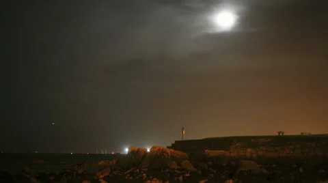 Timelapse of Dublin coast in the evening time with Full Moon Stock Footage 33576554