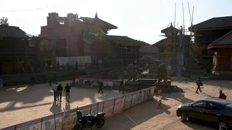 Timelapse: Durbar Square tourists walking and temples being repaired Stock Footage 79854530