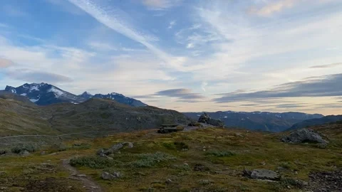 Timelapse during sunset over a snow-covered mountain range in Norway. Video stock 196246211