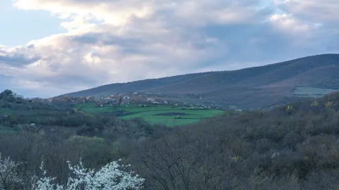 Timelapse of an early spring sunset over a remote Georgian village Stock-Footage 332718313