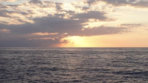 Timelapse of early sun between clouds at ocean Stock Footage 297082218
