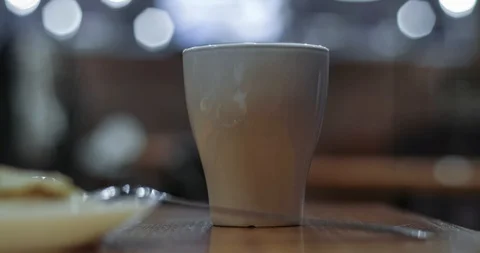 Timelapse of eating, tea drinking with bread, breakfast Stock-Footage 129602830