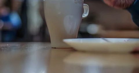 Timelapse of eating, tea drinking with bread, breakfast Stock-Footage 129602850