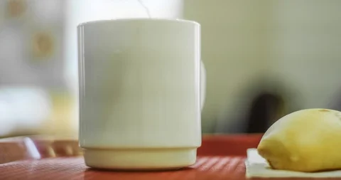 Timelapse of eating, tea drinking with bread, breakfast Stock-Footage 129602889
