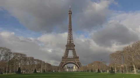 Timelapse of Eiffel Tower and Champ de Mars time lapse clouds attraction icon Stock Footage 10771824