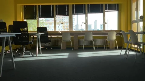 Timelapse with an empty study room and light passing through windows. Video stock 253714647