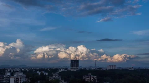 Timelapse - Epic storm clouds rising behind a building 4K60 Stock Footage 271195388