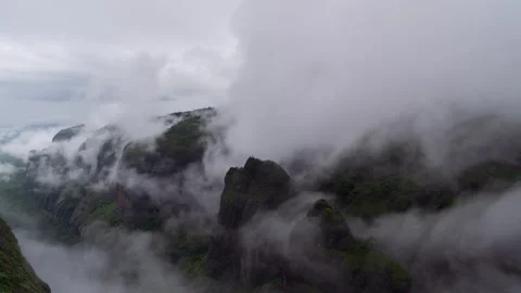 Timelapse - Epic storm clouds rolling through a mountain 4K30 Stock Footage 270357525