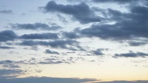 Timelapse, evening clouds float across the blue sky at sunset. Stock-Footage 170567424