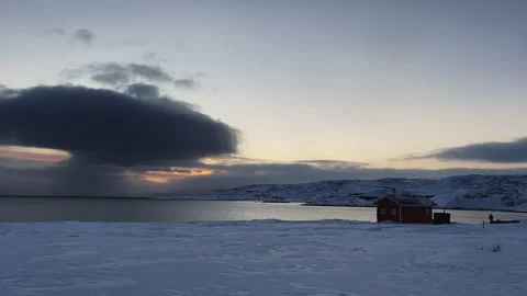 Timelapse. Evening cloudy sky over a snowy field 스톡 동영상 249391096