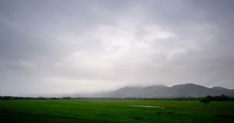 Timelapse, Evening fog falls on the mountain ranges. Stock Footage 81876951