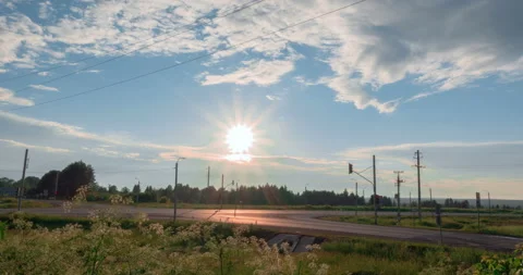 Timelapse of the evening sky. Beautiful sunset. Country road. Stock Footage 116901210
