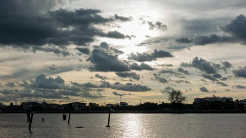 Timelapse of evening sky with Chao Phraya river in front, Bangkok Thailand Stock Footage 136481386