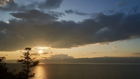 Timelapse of the evening sky. sunset on Baikal. Stock-Footage 114669698