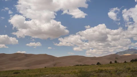 Timelapse of Ever-shifting Clouds Over The Great Sand Dunes National Park Stock Footage 258173363