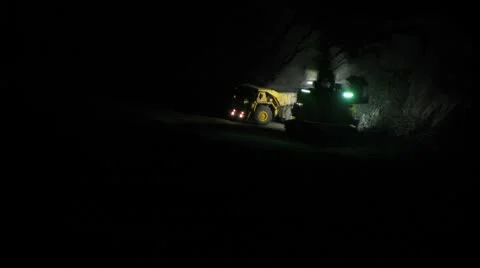 Timelapse. Excavator loading huge dump trucks Stock Footage 10755647