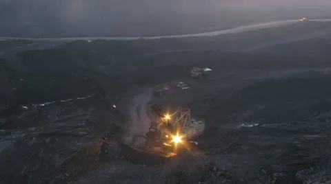 Timelapse. Excavator loading huge dump trucks Stock Footage 10756215