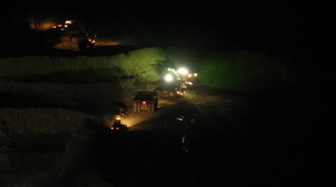 Timelapse. Excavator loading huge dump trucks Stock Footage 10756217