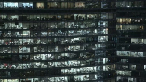 Timelapse facade shot of skyscraper s facade in downtown. Locked down night shot Video stock 103855901