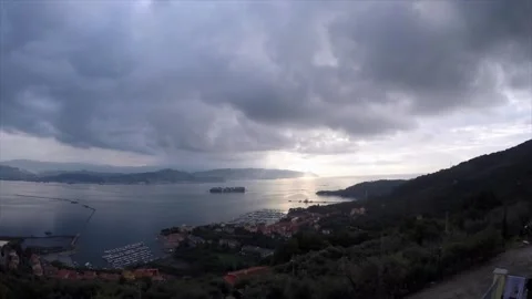 Timelapse Of Fast Approaching Container Ship And Moving Clouds Over Bay Stock Footage 345441728