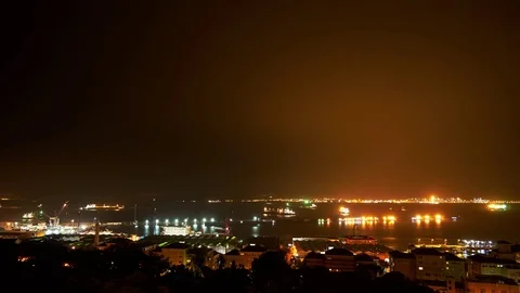 Timelapse of fast clouds over the Port of Gibraltar Stock Footage 77402498
