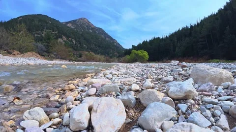 Timelapse of Fast Flowing River in Mountain Valley Stock Footage 305236577
