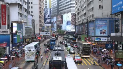 Timelapse Fast motion of Busy streets in Hong Kong in rainy day, China Stock Footage 12367794