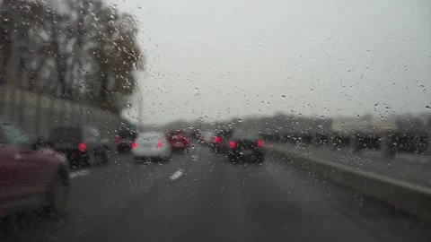 Timelapse (fast motion) of defocused heavy traffic in the city on a winter day Stock Footage 247380736