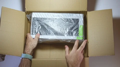 Timelapse fast motion man unboxing Nvidia RTX 5000 Quadro Stock Footage 103339657