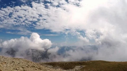 Timelapse of fast moving clouds in the mountains Stock Footage 123013172