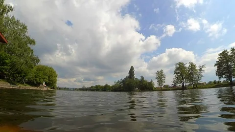 Timelapse Fast video timelapse landscape pier river sky clouds trees Stock Footage 92035359
