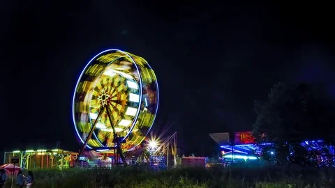 Timelapse of a ferris wheel at night Stock Footage 128065057