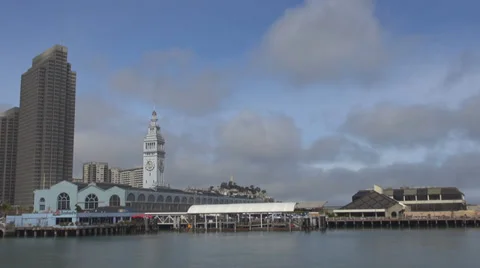 Timelapse Ferry building platform port tower waterfront dock yacht pontoon cloud Stock Footage 37559074
