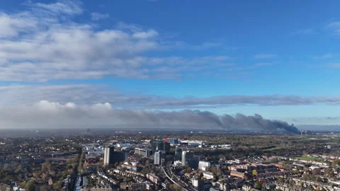Timelapse of fire smoke visible over Hounslow, London Stock Footage 323680976
