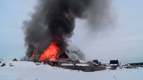 Timelapse fire in the village in winter Stock Footage 87541446