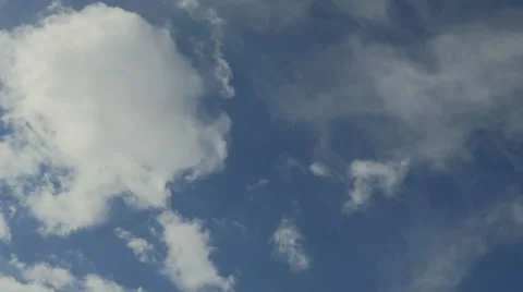 Timelapse floating clouds on a blue sky over the city 4K Video stock 48506566