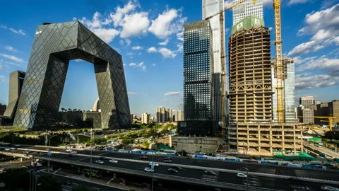Timelapse of the floating clouds over the landmark building at Guomao CBD Stockbeeldmateriaal 95785992