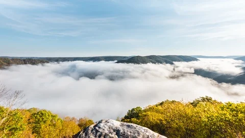 Timelapse of floating fog clouds at Grandview Overlook in West Virginia WV loop Stock Footage 119028344