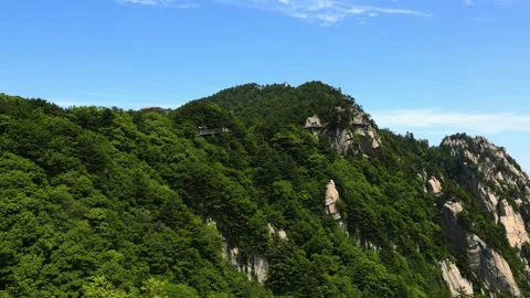 Timelapse of flowing clouds over the beautiful Mountain Stock Footage 304219217