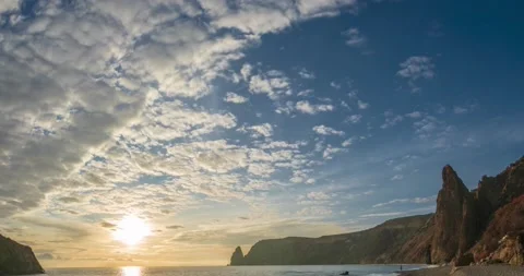 Timelapse of fluffy Altocumulus clouds, moving through the sky at different Stock Footage 146015924