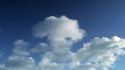 Timelapse of fluffy clouds on blue sky. Stock Footage 44563799