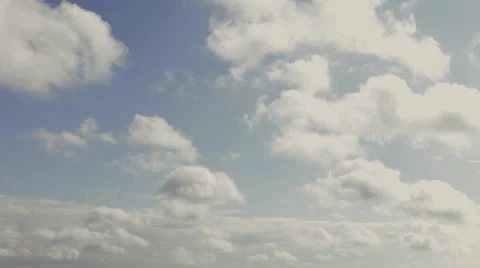 Timelapse: Fluffy clouds flying by Stock Footage 31652858
