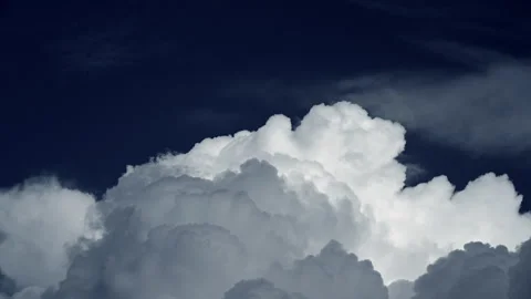 Timelapse Of fluffy Cumulus Clouds Forming on deep blue sky Stock Footage 164611289