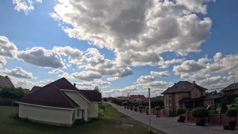 Timelapse of fluffy white clouds. Video of clouds flying across the blue sky Stock Footage 284206990