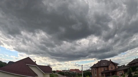 Timelapse of fluffy white clouds. Video of clouds flying across the blue sky Stock Footage 284215080