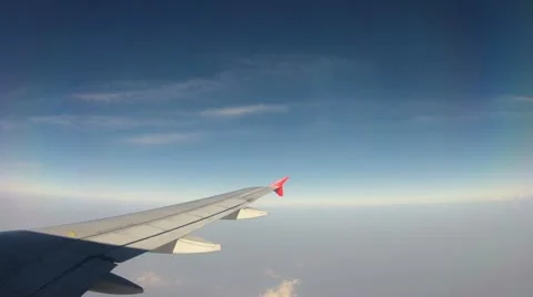 Timelapse: fly in the sky, into the clouds, from aircraft window Vídeo Stock 10872429