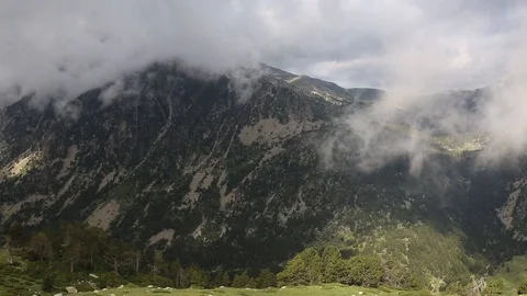 Timelapse with fog and clouds in mountains Stock Footage 100123033