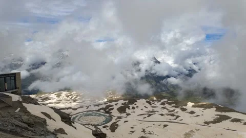 Timelapse of fog and clouds moving at Gornergrat Observatory in the Swiss Alps Stock Footage 308289215