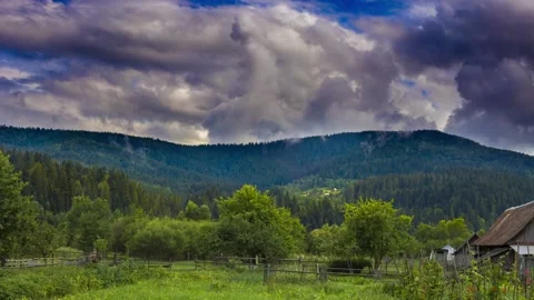 Timelapse of fog and dramatic clouds over Carpathian mountains Stock Footage 106727126